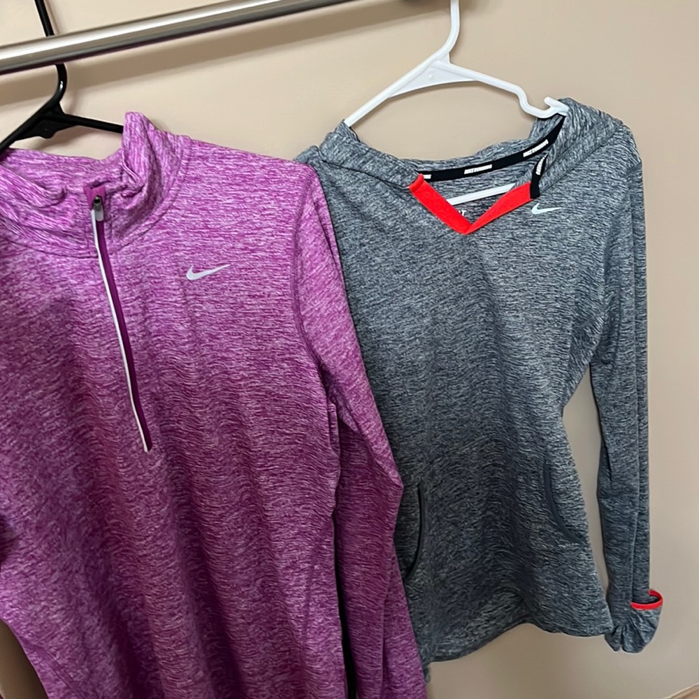 Two Nike running long sleeves